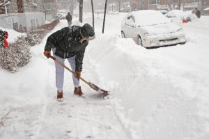 Prevent Back Pain While Shoveling